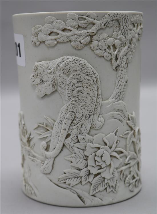 A Chinese biscuit porcelain brush pot, seal mark Wang Binrong, 5in.